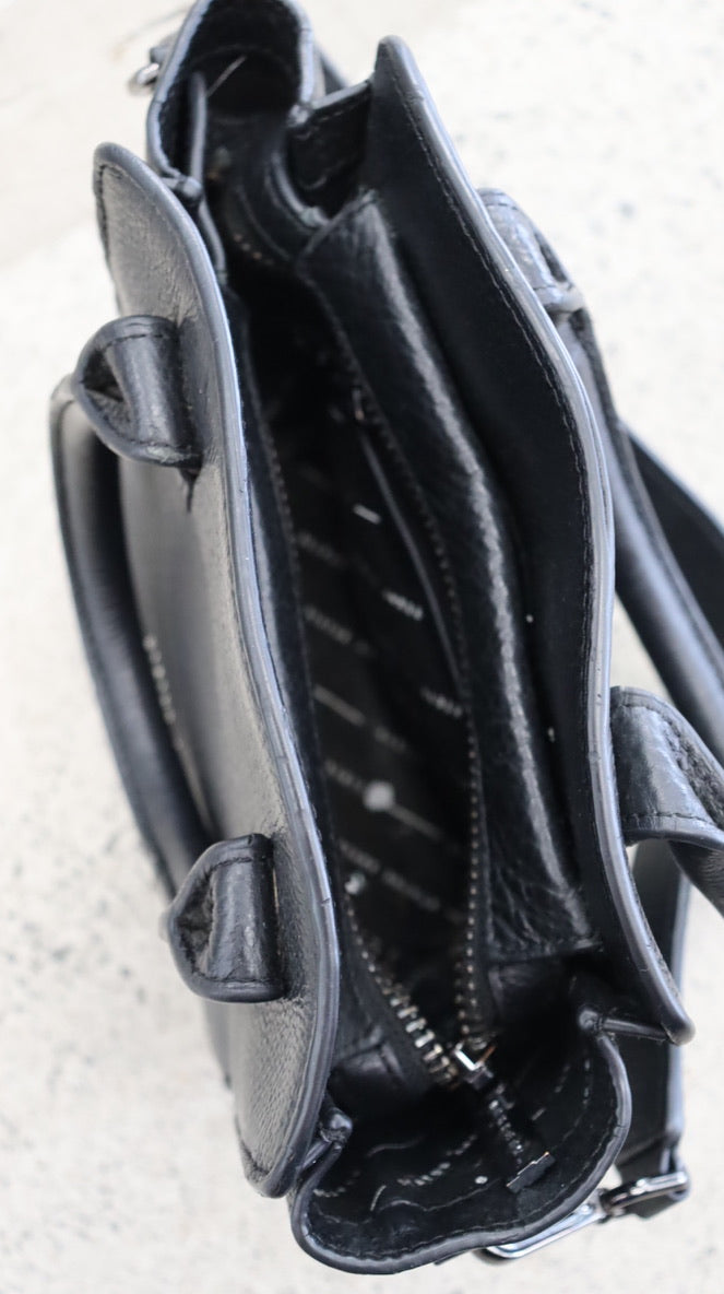 STATUS ANXIETY. handbag N/A