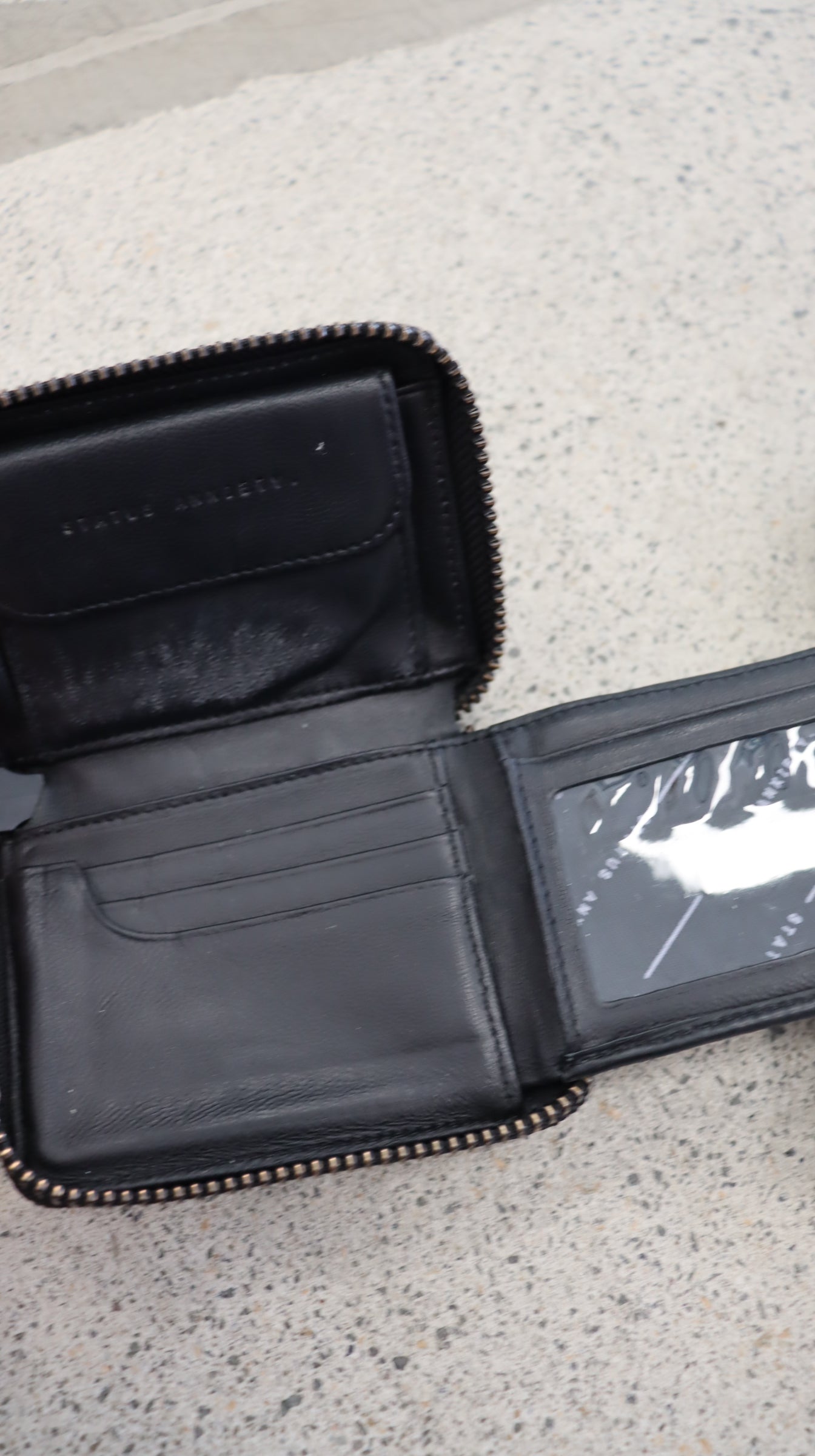 STATUS ANXIETY. Wallet N/A