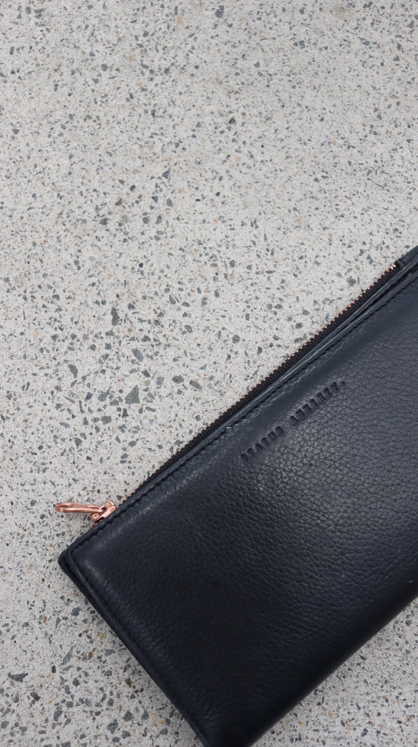 STATUS ANXIETY. Wallet N/A