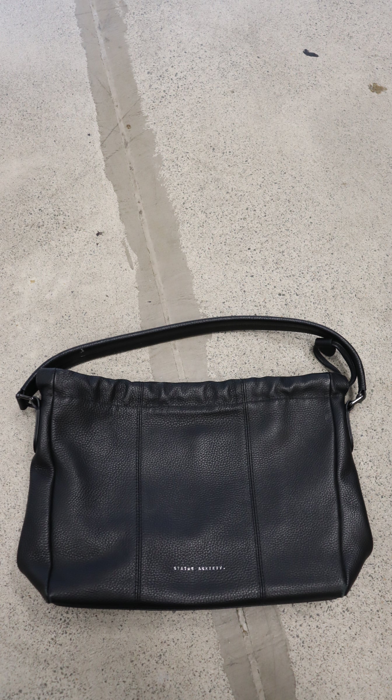 STATUS ANXIETY. handbag N/A