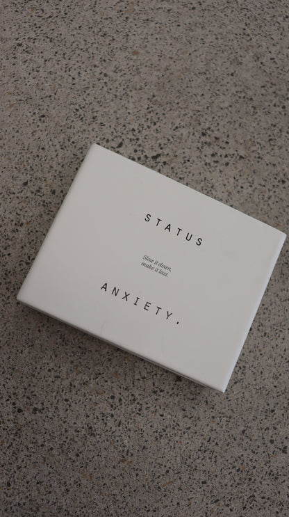 STATUS ANXIETY. Wallet N/A