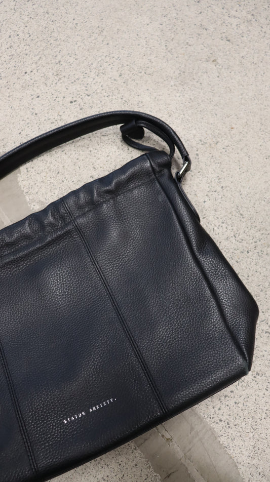 STATUS ANXIETY. handbag N/A