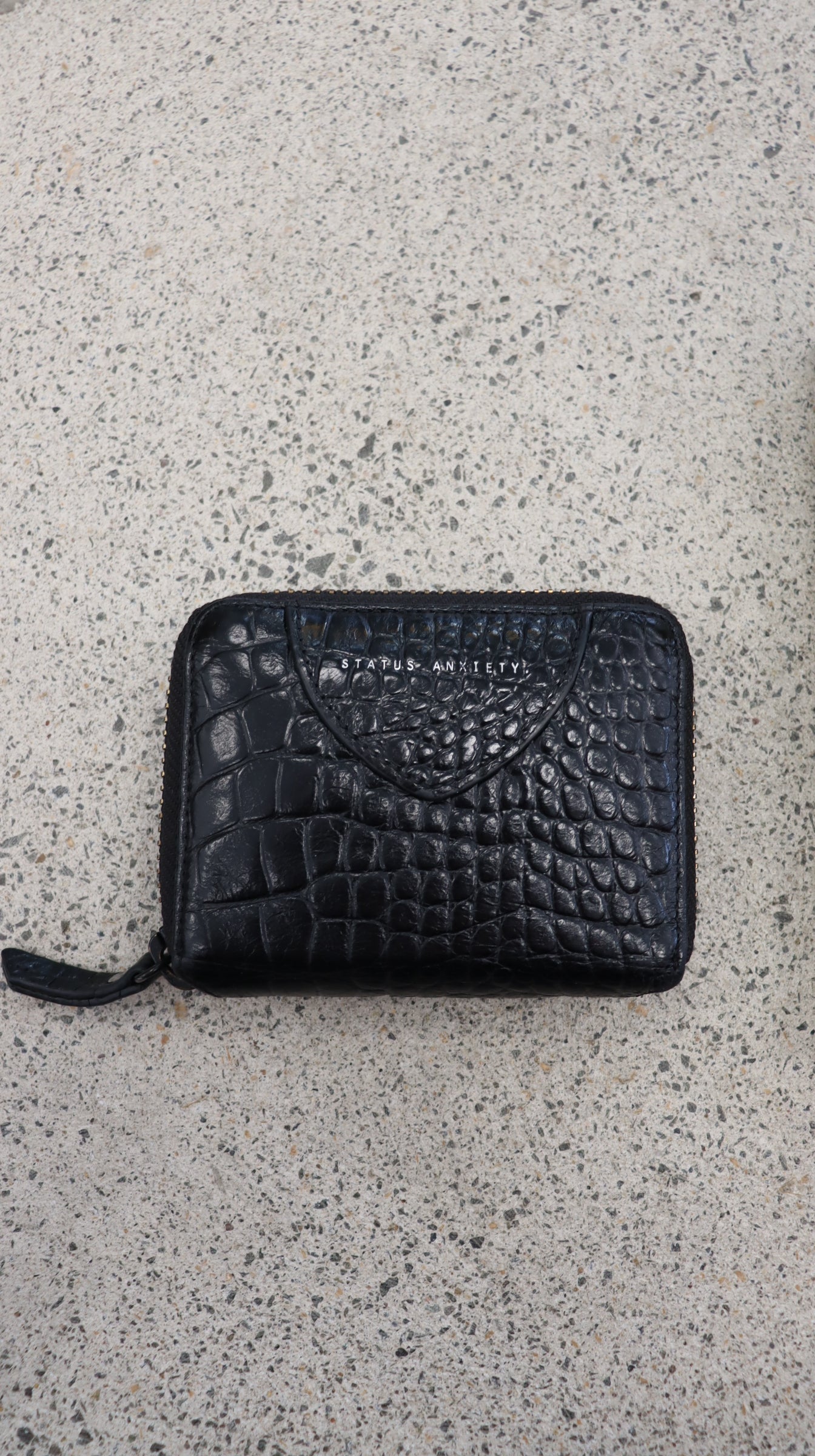 STATUS ANXIETY. Wallet N/A