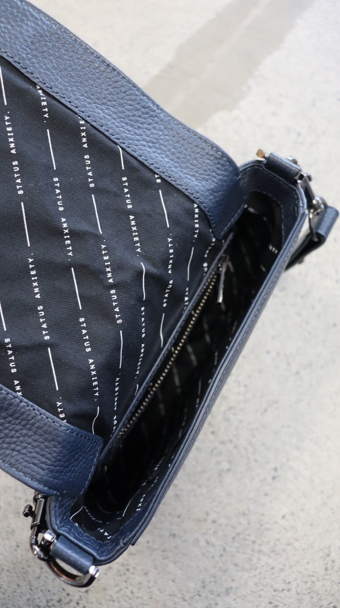 STATUS ANXIETY. handbag N/A