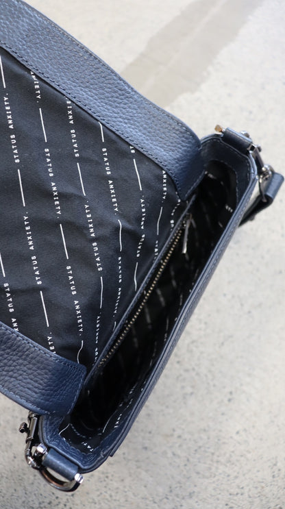 STATUS ANXIETY. handbag N/A